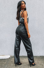 Black faux leather high-waisted pants with a relaxed straight leg