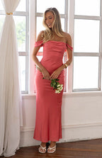 Front view of the pink off-shoulder formal dress with a ruched bodice and a long, fitted skirt