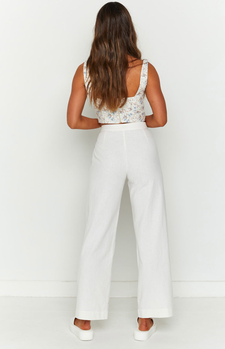 White linen high waist pants with a cropped wide leg and flat front