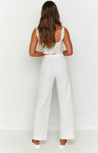 White linen high waist pants with a cropped wide leg and flat front