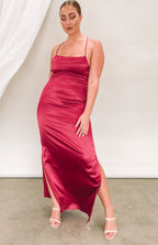 Wine satin maxi dress with square neckline, thin spaghetti straps, high side split, and ruched detail