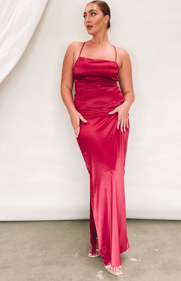 Wine satin formal maxi dress with thin criss-cross back straps and a ruched side split