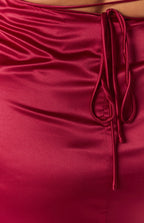 Wine satin fabric with gathered side detail and delicate self-tie straps