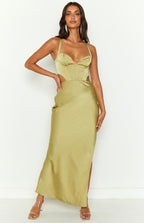 Front view of a green satin maxi dress with a sweetheart neckline, corset bodice, and waist cutouts