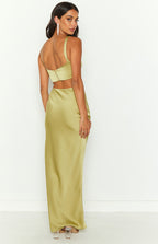 Rear view of a green satin maxi dress showing the back zipper closure on the top and a waist cutout